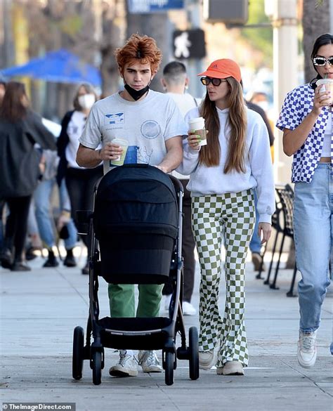 Clara Berry, KJ Apa Go for a Dip with Son Sasha in Family Photos